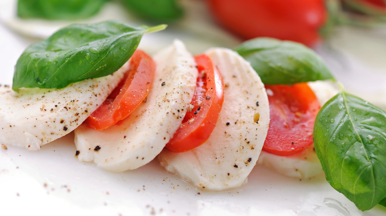 Caprese salad on white plate