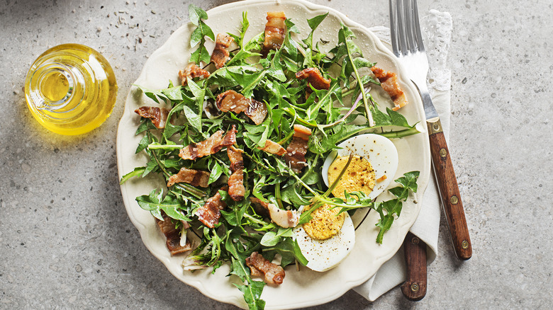 Dandelion salad with hot bacon dressing