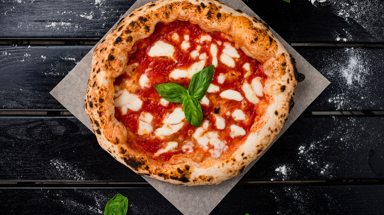 Pizza with mozzarella and basil