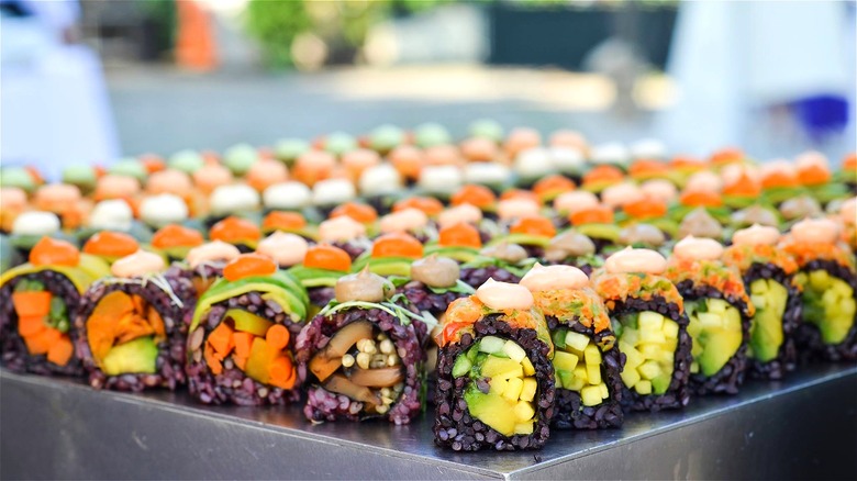 Vegan sushi rolls with black rice 