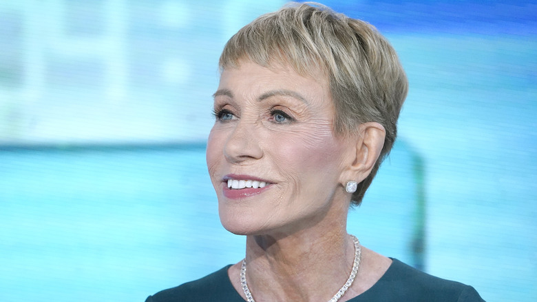 Barbara Corcoran smiling on blue background