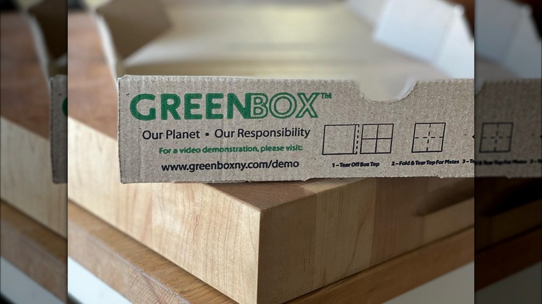 A closeup of GreenBox's logo