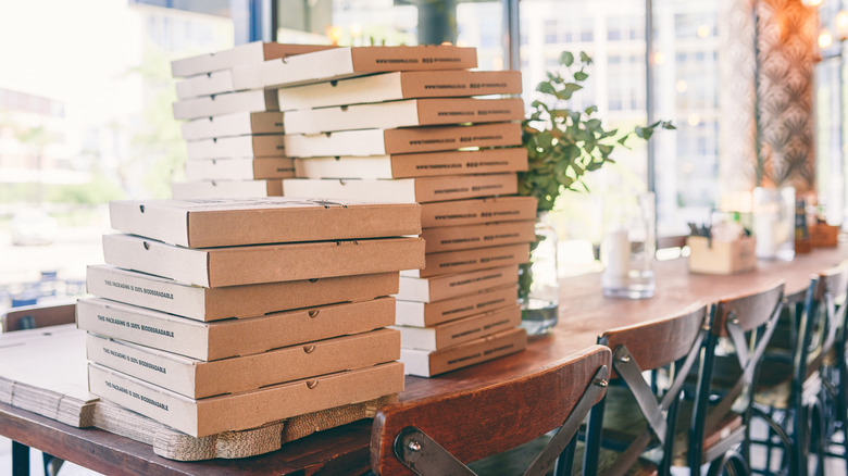 A stack of pizza boxes