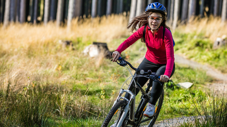 teenager riding a bicycle