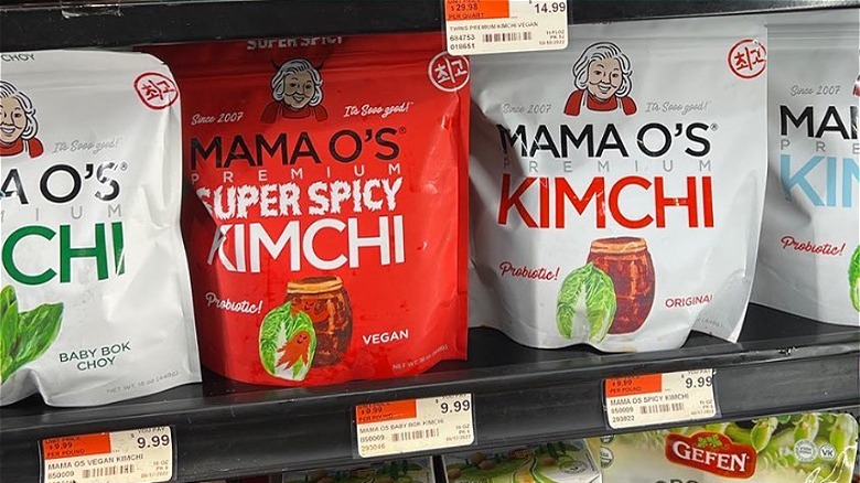 Packets of mama o's premium kimchi on store shelves