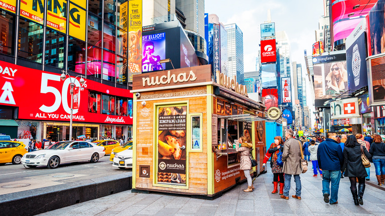 Nuchas stand in New York City serving customers