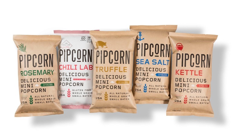 Collection of Pipcorn mini popcorn flavors on white background