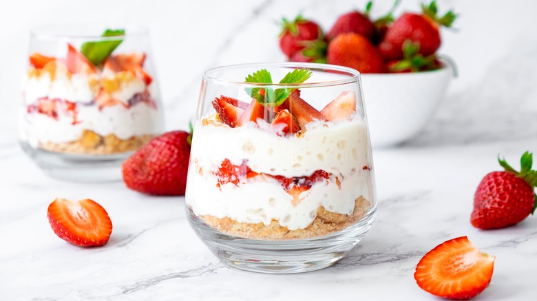 Yogurt with strawberries in glass