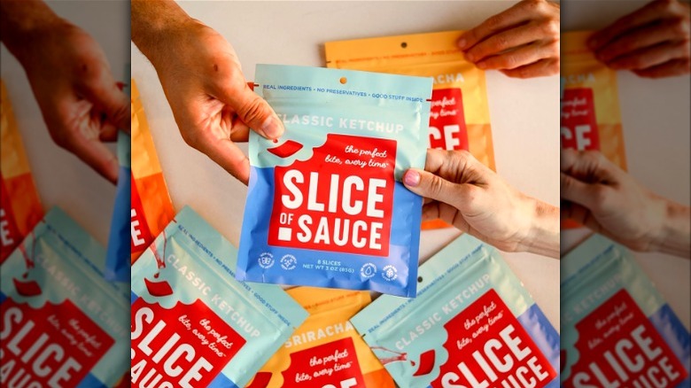 Hands holding Slice of Sauce package