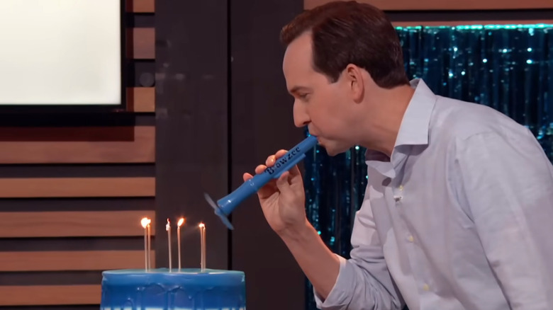 Mark Lareau blows out birthday candles with a Blowzee