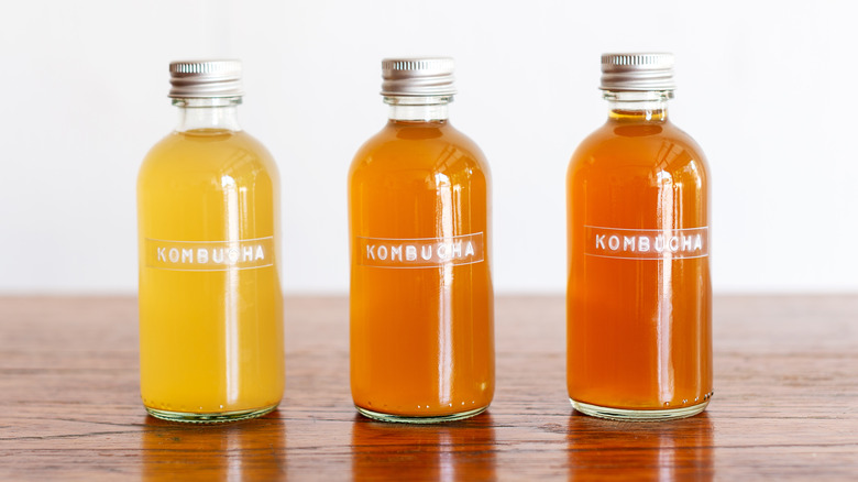 bottled kombucha sitting on table