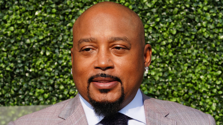 Daymond John smiles