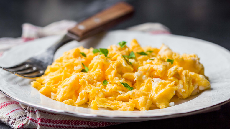 scrambled eggs served on plate