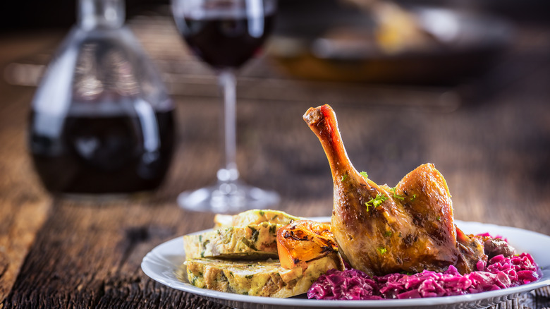 Duck confit plate with wine