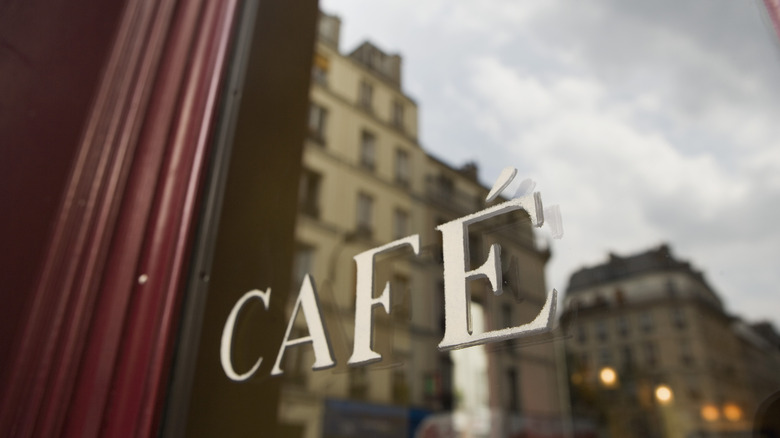 window with "cafe" sign