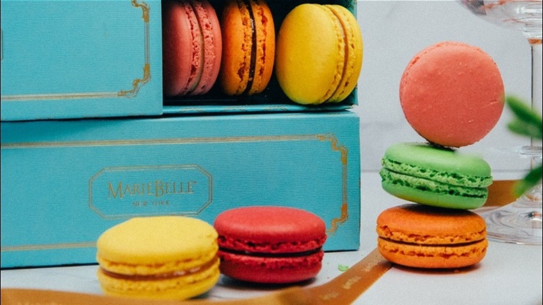 colorful macarons with blue box