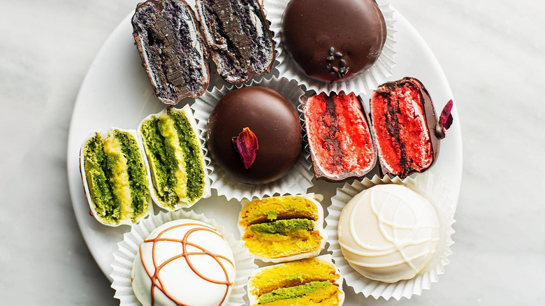 assortment of chocolate covered macarons