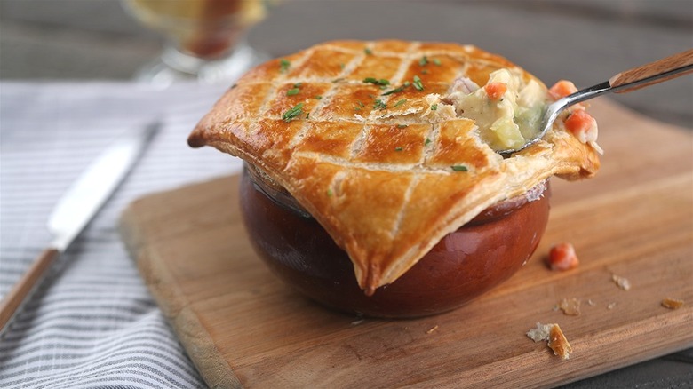 Chicken pot pie with spoon