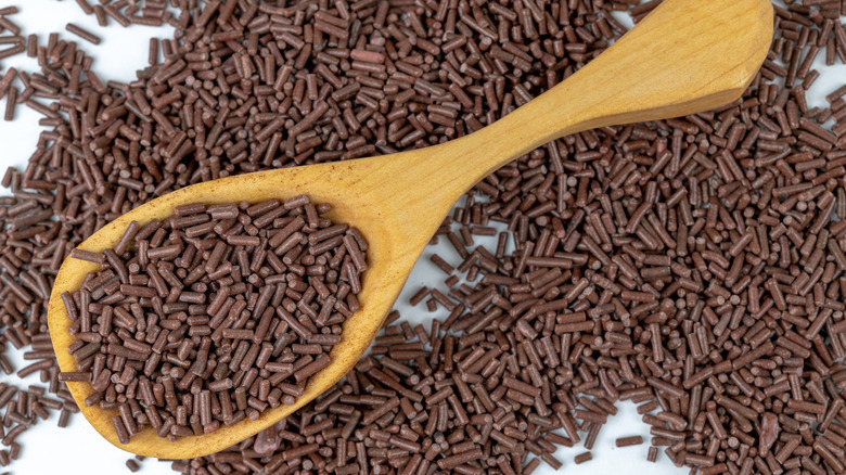 chocolate sprinkles on a spoon