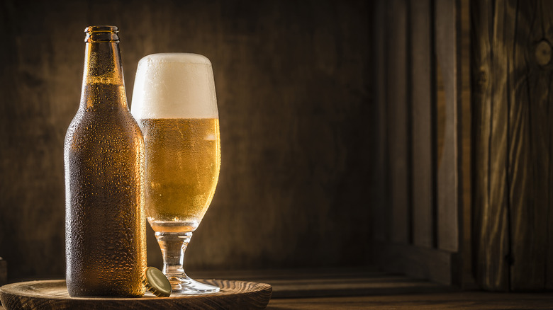 glass of beer with bottle