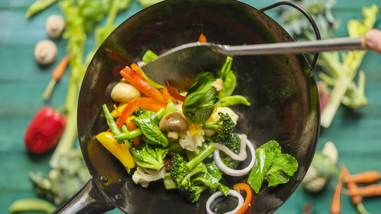 stir fry in skillet with spatula