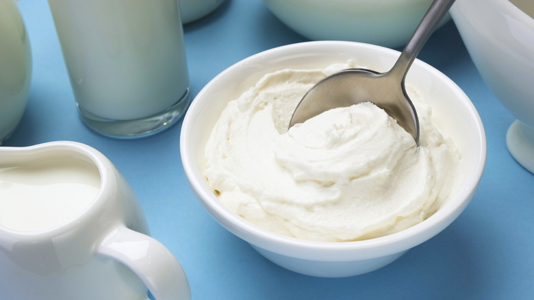 bowl of whipped cream with spoon