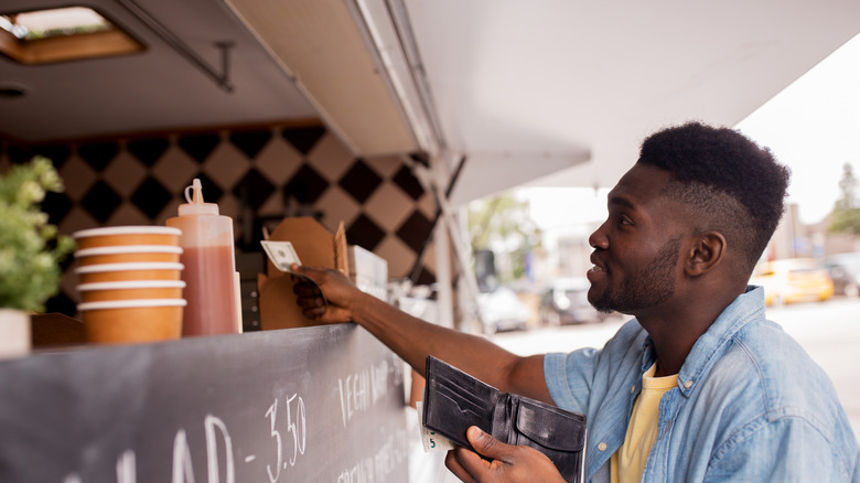 Man paying for food