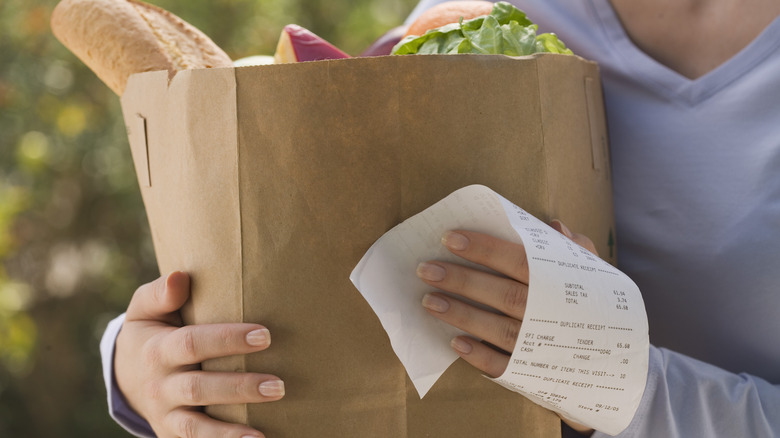 grocery bag with shopping receipt