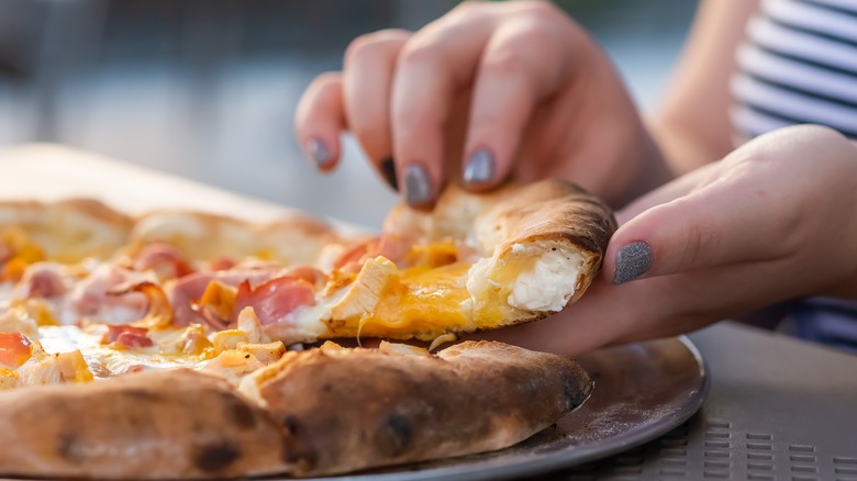 Lightly charred stuffed crust pizza