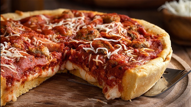 Deep-dish pizza with slice removed 