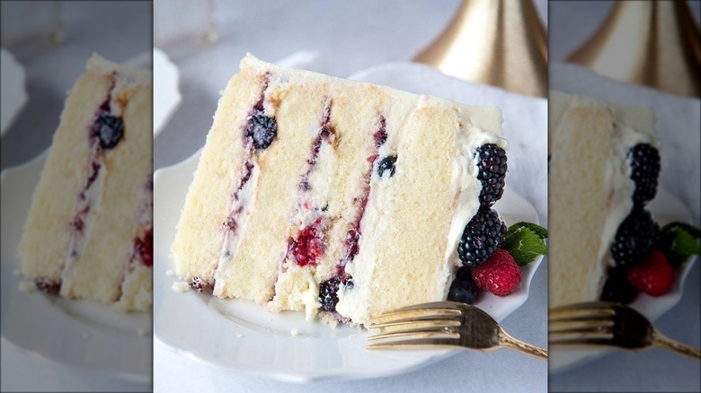 slice of berry chantilly cake