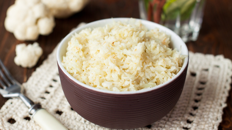 Bowl of cauliflower rice with florets