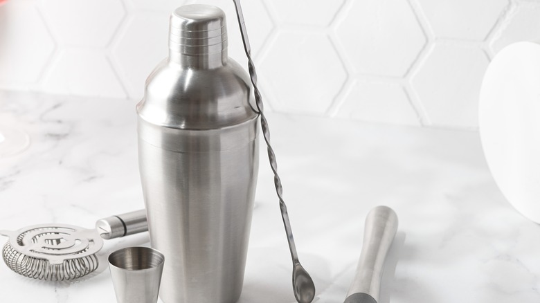 Stainless steel cocktail shaker with bar tools