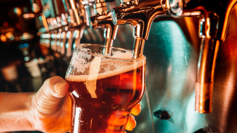 beer being poured on draft