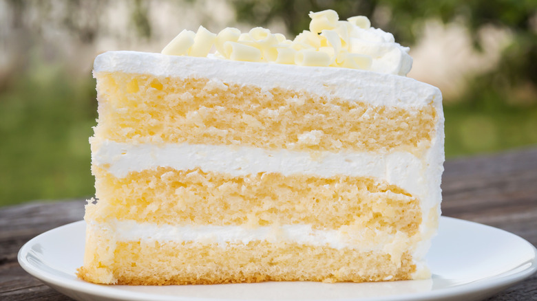 white vanilla cake slice on white plate