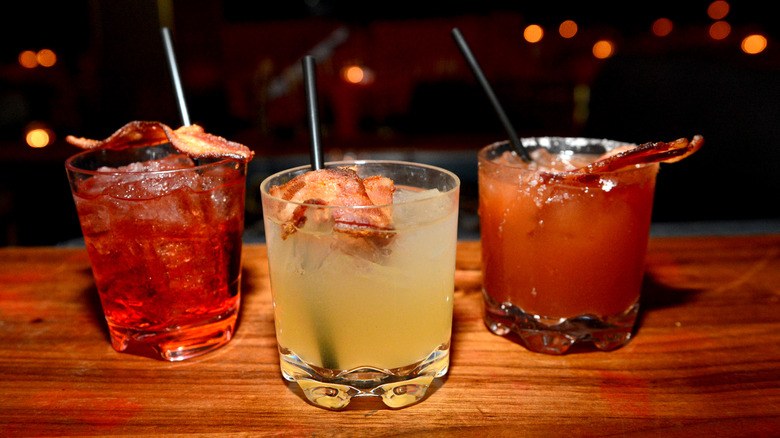 Three bacon-topped cocktails