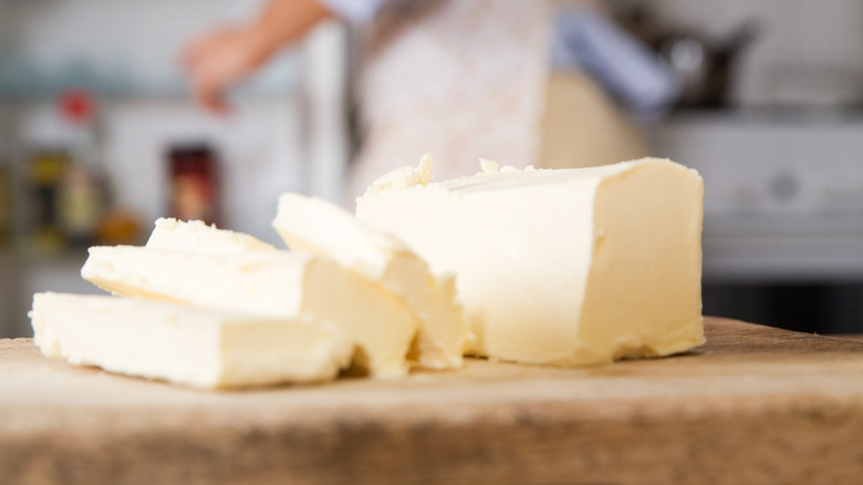 butter sliced on cutting board