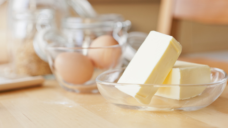 Butter and eggs on counter