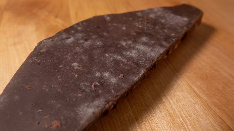 bloomed dark chocolate on wood table