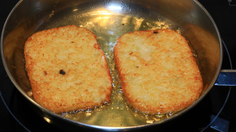 hash brown pancakes in a row with dipping sauces