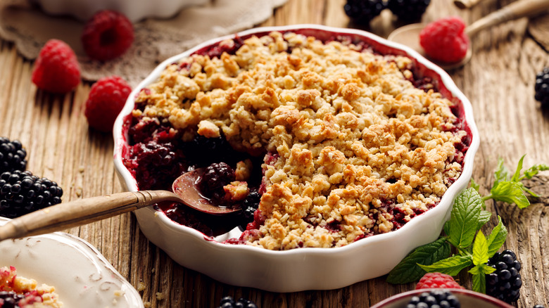 Cherry crumble with spoons