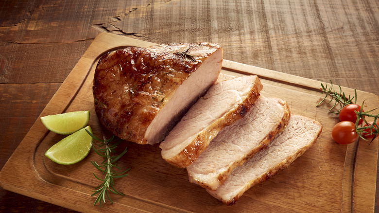 roast pork on a carving board