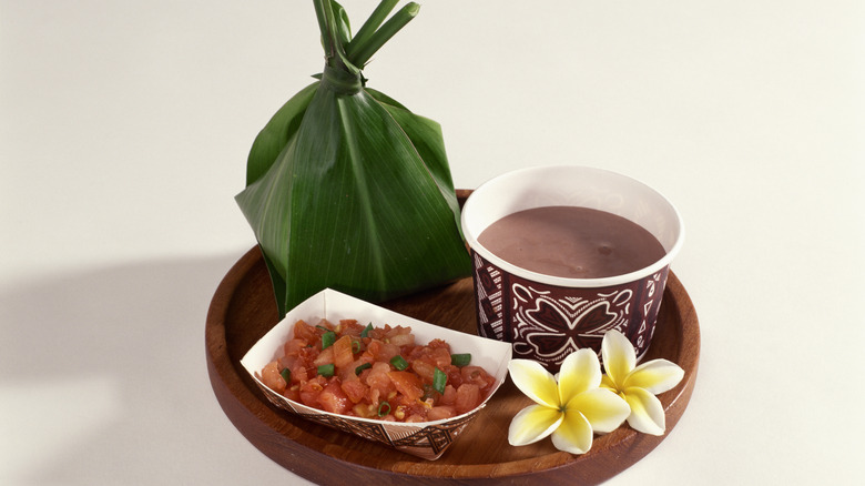 container of poi with Hawaiian foods