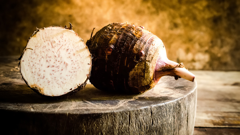 taro root on chopping block