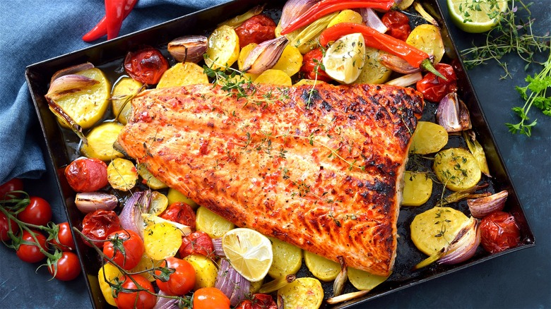 Charred salmon over roasted vegetables 