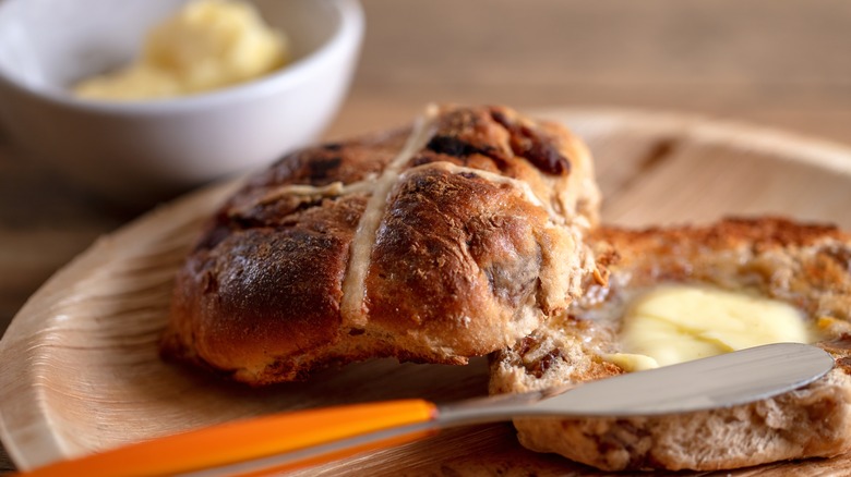 Hot cross bun with butter