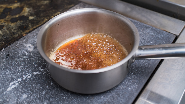 Brown sugar glaze bubbling in pot