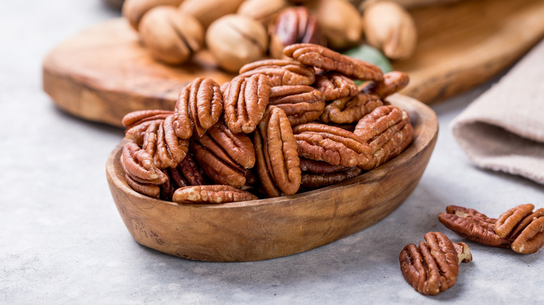 Pecans on a gray background