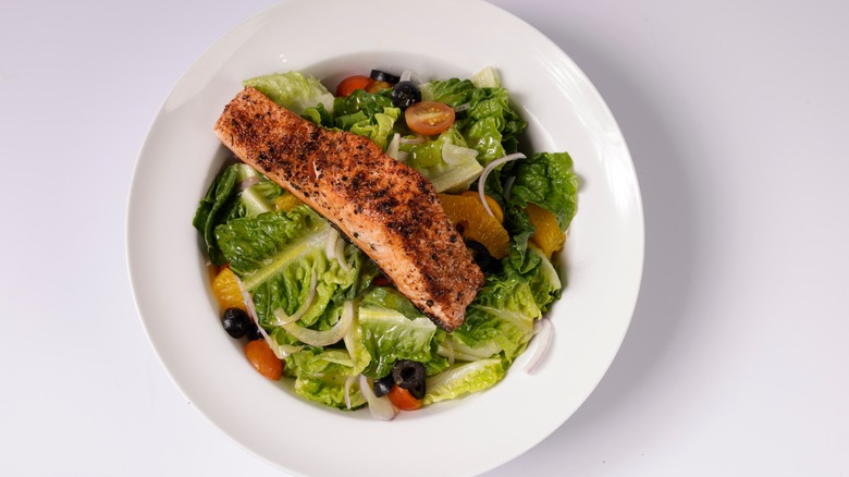 Salmon on a Caesar salad