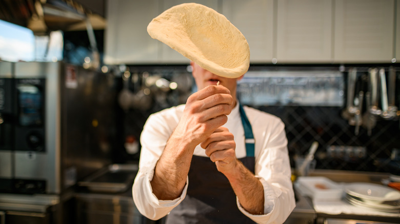 why-it-s-a-mistake-to-roll-out-your-pizza-dough